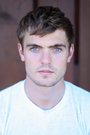 Alex Roe isHolt