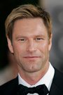 Aaron Eckhart isHarvey Dent