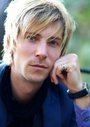 Troy Baker isThe Joker (voice)