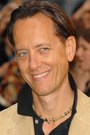 Richard E. Grant isDr. Zander Rice