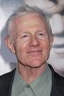 Raymond J. Barry isCaleb Warrens