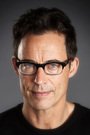 Tom Cavanagh isHarrison Wells