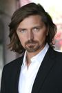 Robin Atkin Downes isDetective Harvey Bullock (voice)