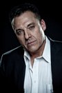 Tom Sizemore isDamian White